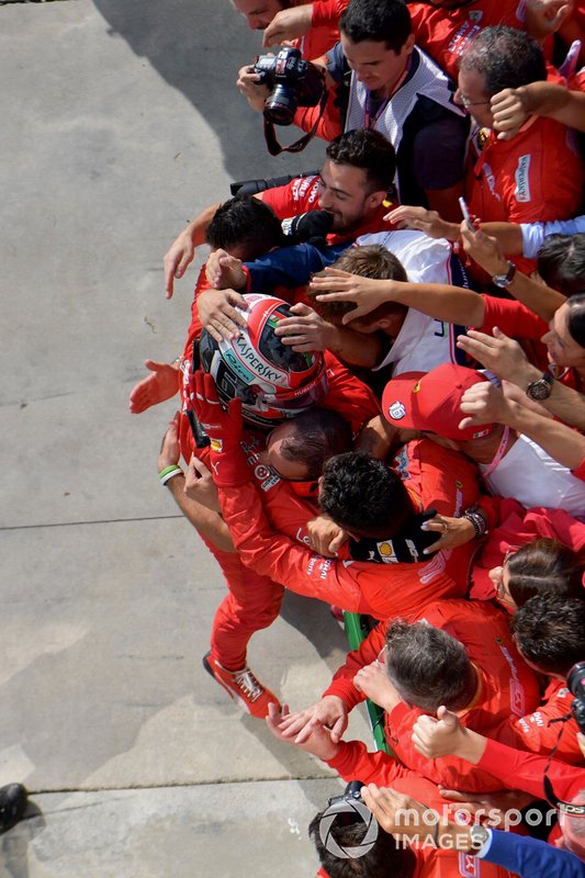 Charles Leclerc, Ferrari, 1st position, celebrates in Parc Ferme with his team
