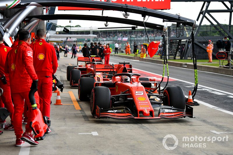 Sebastian Vettel, Ferrari SF90, in the pits during practice