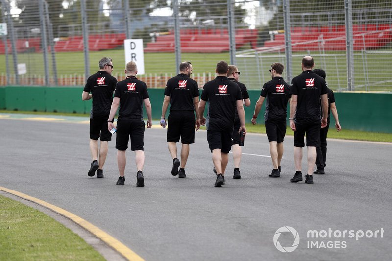 Romain Grosjean, Haas F1 walks the track with members of the team