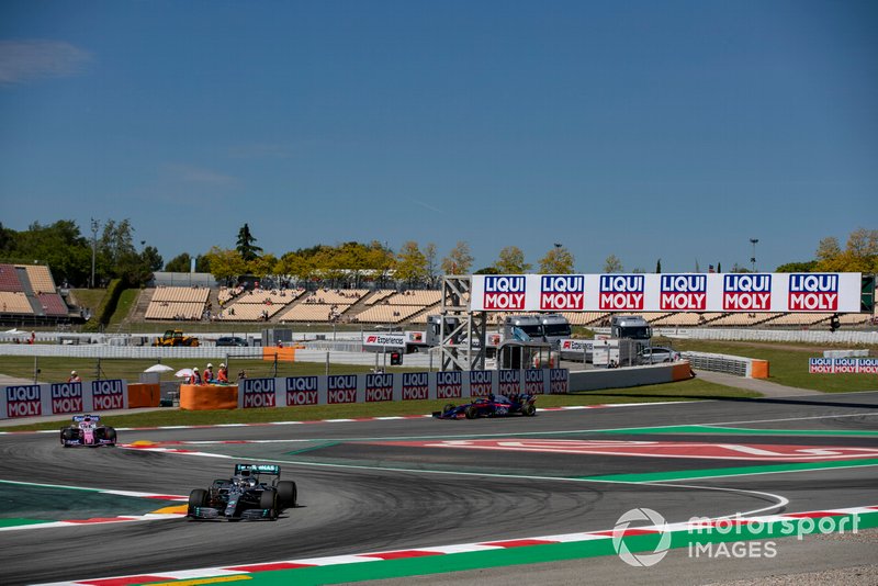 Lewis Hamilton, Mercedes AMG F1 W10, leads Sergio Perez, Racing Point RP19