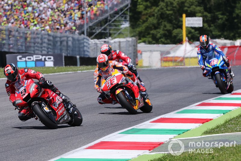 Danilo Petrucci, Ducati Team leads Marc Marquez, Repsol Honda Team