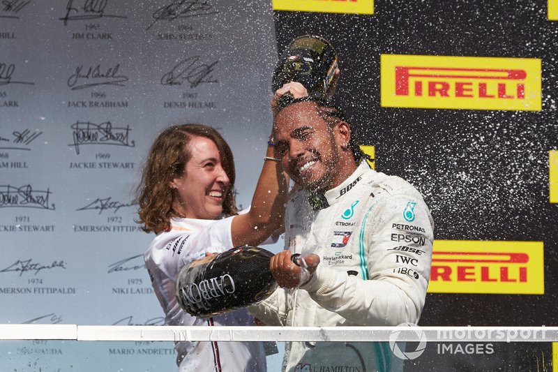 Lewis Hamilton, Mercedes AMG F1, 1st position, celebrates with his team mate on the podium