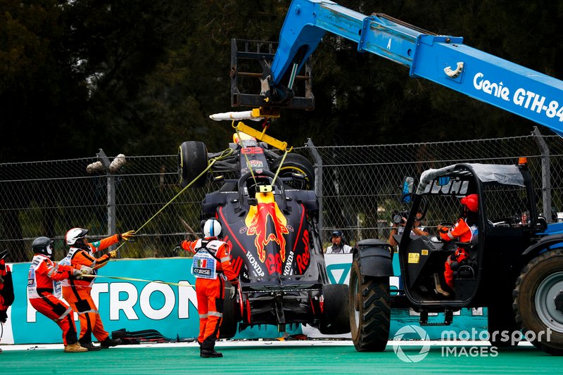 Car of Alex Albon, Red Bull RB15 being recovered after crashing in FP2