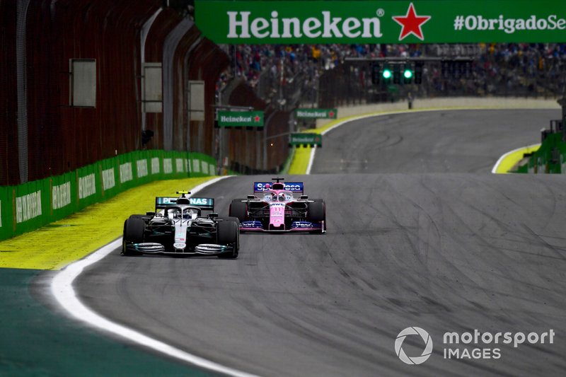 Valtteri Bottas, Mercedes AMG W10, leads Sergio Perez, Racing Point RP19