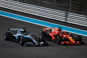 Lewis Hamilton, Mercedes AMG F1 W09 EQ Power+ and Sebastian Vettel, Ferrari SF71H wave to the crowd at the end of the race 