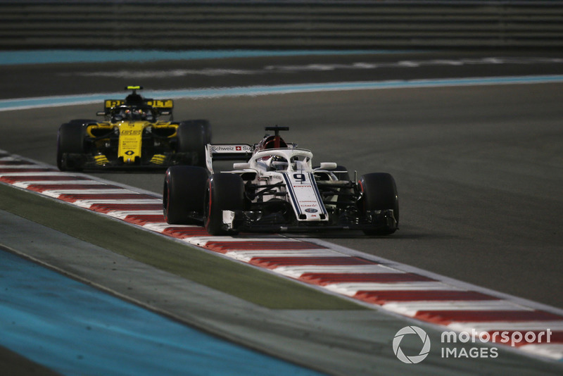Marcus Ericsson, Sauber C37 and Carlos Sainz Jr., Renault Sport F1 Team R.S. 18