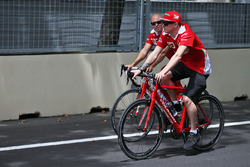 Kimi Raikkonen, Ferrari rides the circuit with Mark Arnall, Personal Trainer