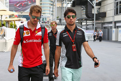 (Da Sx a Dx): Sebastian Vettel, Ferrari con Sergio Perez, Sahara Force India F1