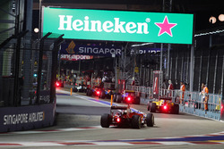 Sebastian Vettel, Ferrari SF16-H follows the field through the pit lane behind the FIA Safety Car