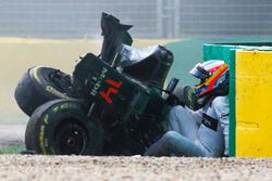 Fernando Alonso, McLaren MP4-31 exits his car after a huge crash