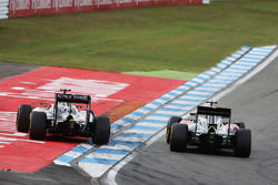 Fernando Alonso, McLaren MP4-31 and Sergio Perez, Sahara Force India F1 VJM09 battle for position