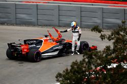 Fernando Alonso, McLaren MCL32, climbs out of his car after stopping in FP1, technical issues