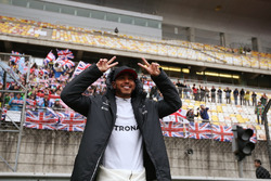 Lewis Hamilton, Mercedes AMG, with fans in the grandstand