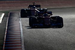 Kimi Raikkonen, Ferrari SF70H, leads Fernando Alonso, McLaren MCL32