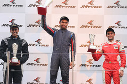 Podium: race winner Anindith Reddy, second place Nayan Chatterjee, third place Akhil Rabindra