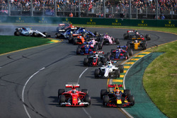 Kimi Raikkonen, Ferrari SF70H and Max Verstappen, Red Bull Racing RB13