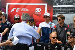 Chase Carey, Chief Executive Officer and Executive Chairman of the Formula One Group and Lance Stroll, Williams