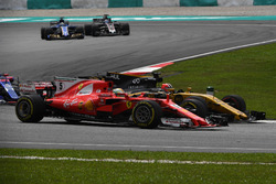 Sebastian Vettel, Ferrari SF70H and Nico Hulkenberg, Renault Sport F1 Team RS17 battle