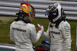 Pole sitter Lewis Hamilton, Mercedes AMG F1 and Valtteri Bottas, Mercedes AMG F1 celebrate in parc ferme