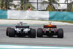 Max Verstappen, Red Bull Racing RB13, passes Lewis Hamilton, Mercedes AMG F1 W08, for the lead