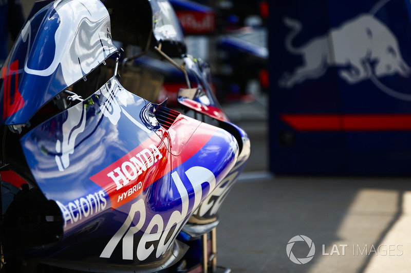 Honda logos are displayed on the bodywork of a Toro Rosso STR13