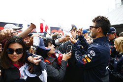 Daniel Ricciardo, Red Bull Racing, signs autographs for fans