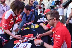 Sebastian Vettel, Ferrari signs autographs for the fans