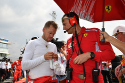 Sebastian Vettel, Ferrari on the grid with Riccardo Adami, Ferrari Race Engineer