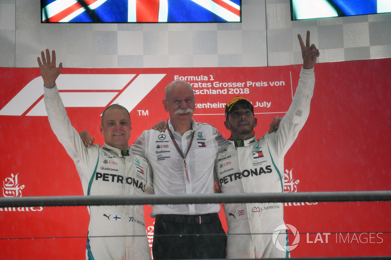 Valtteri Bottas, Mercedes-AMG F1, Dr. Dieter Zetsche, CEO of Daimler AG and Lewis Hamilton, Mercedes-AMG F1 celebrate on the podium