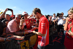 Sebastian Vettel, Ferrari signs autographs for the fans