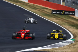 Kimi Raikkonen, Ferrari SF71H and Nico Hulkenberg, Renault Sport F1 Team R.S. 18