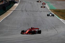 Sebastian Vettel, Ferrari SF71H, leads Valtteri Bottas, Mercedes AMG F1 W09