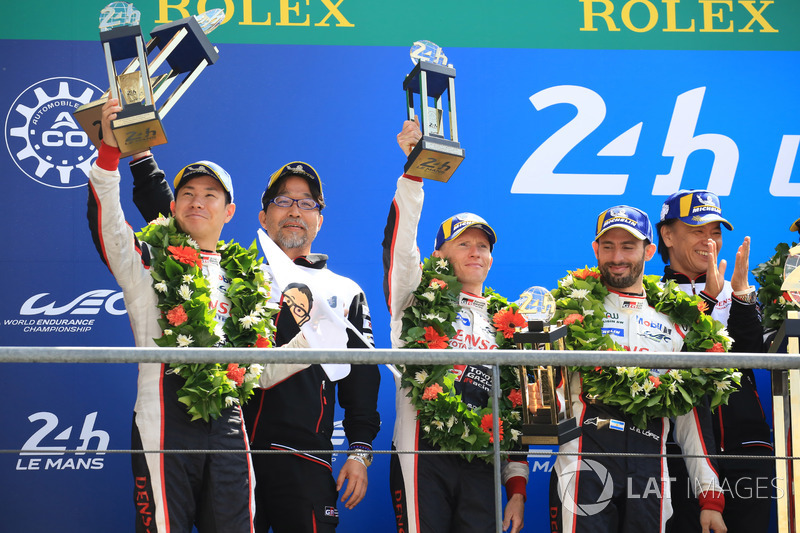 Overall podium: second place Mike Conway, Kamui Kobayashi, Jose Maria Lopez, Toyota Gazoo Racing