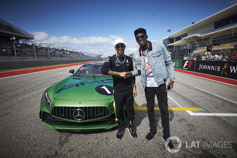 Усэйн Болт и гонщик Mercedes AMG F1 Льюис Хэмилтон