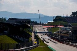 The safety car leads George Russell, ART Grand Prix and the rest of the field at the start of the race