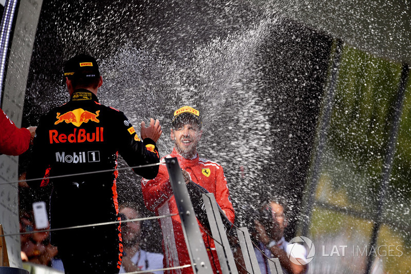 Sebastian Vettel, Ferrari celebrates with the champagne on the podium