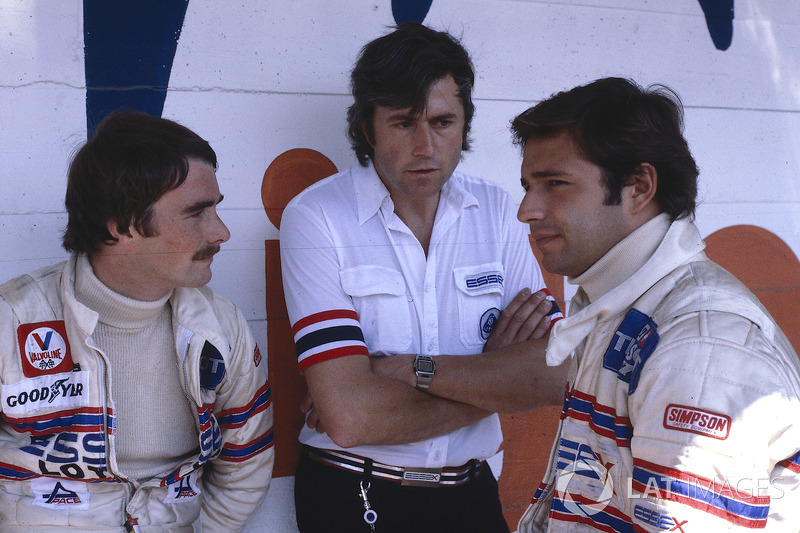 Nigel Mansell with Elio De Angelis, both Lotus Ford