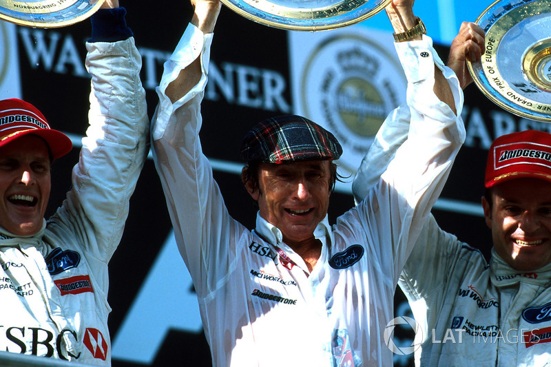 L to R Winner Johnny Herbert, Team Boss Jackie Stewart and third placed Rubens Barrichello