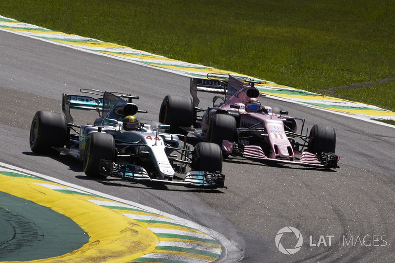 Lewis Hamilton, Mercedes AMG F1 W08, passes Sergio Perez, Sahara Force India F1 VJM10