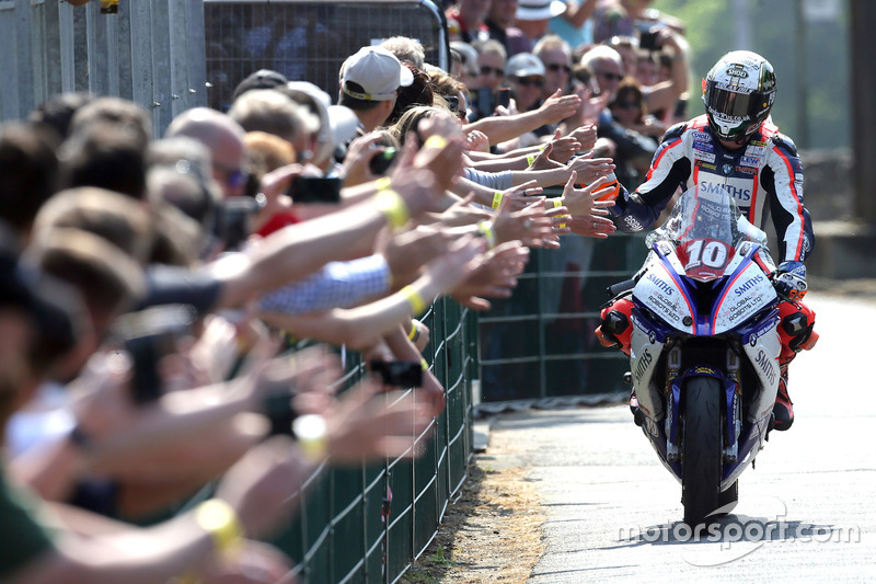 Peter Hickman celebrates winning the RL360º Superstock TT race
