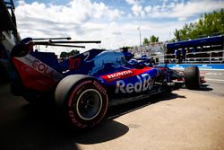Pierre Gasly, Toro Rosso STR13, exits his pt garage.