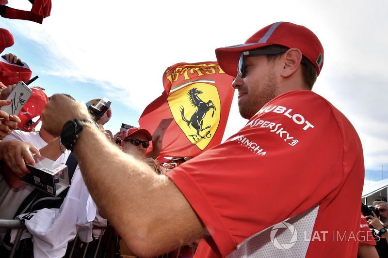 Sebastian Vettel, Ferrari signs autographs for the fans