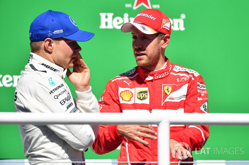 Podium: winner Sebastian Vettel, Ferrari, second place Valtteri Bottas, Mercedes AMG F1