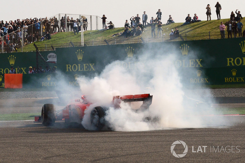 Sebastian Vettel, Ferrari SF71H spins after clashing with Max Verstappen, Red Bull Racing RB14