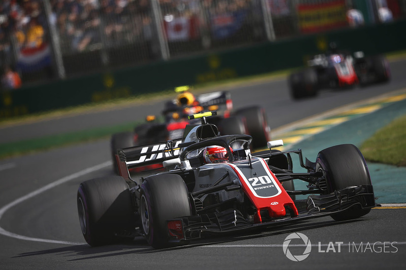 Kevin Magnussen, Haas F1 Team VF-18 Ferrari, leads Max Verstappen, Red Bull Racing RB14 Tag Heuer