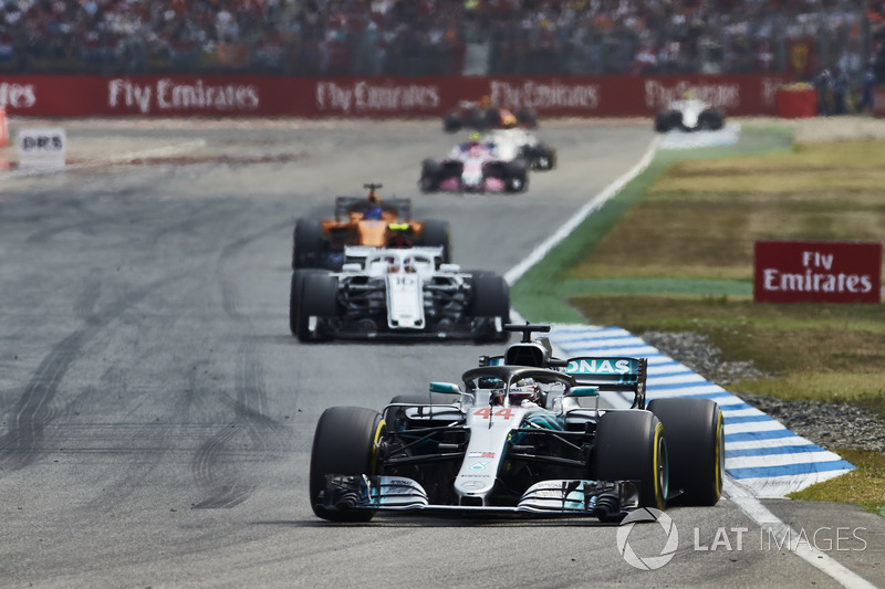 Lewis Hamilton, Mercedes AMG F1 W09, leads Charles Leclerc, Sauber C37