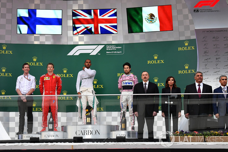 Kimi Raikkonen, Ferrari, Lewis Hamilton, Mercedes-AMG F1 and Sergio Perez, Force India on the podium