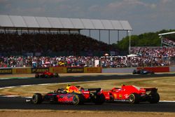 Kimi Raikkonen, Ferrari SH71H and Max Verstappen, Red Bull Racing RB14