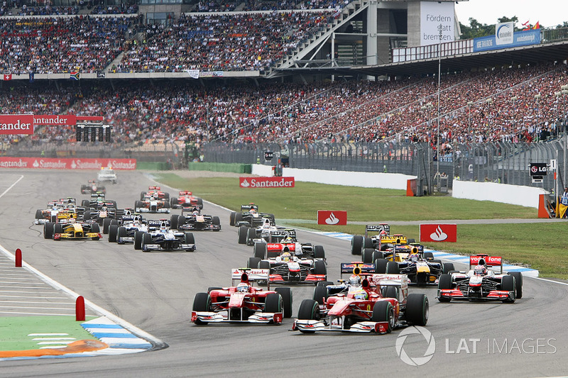 Felipe Massa, Ferrari F10 leads Fernando Alonso, Ferrari F10 at the start of the race