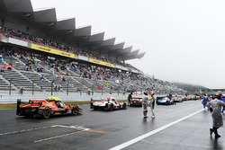 Cars lined up on the start/finish straight